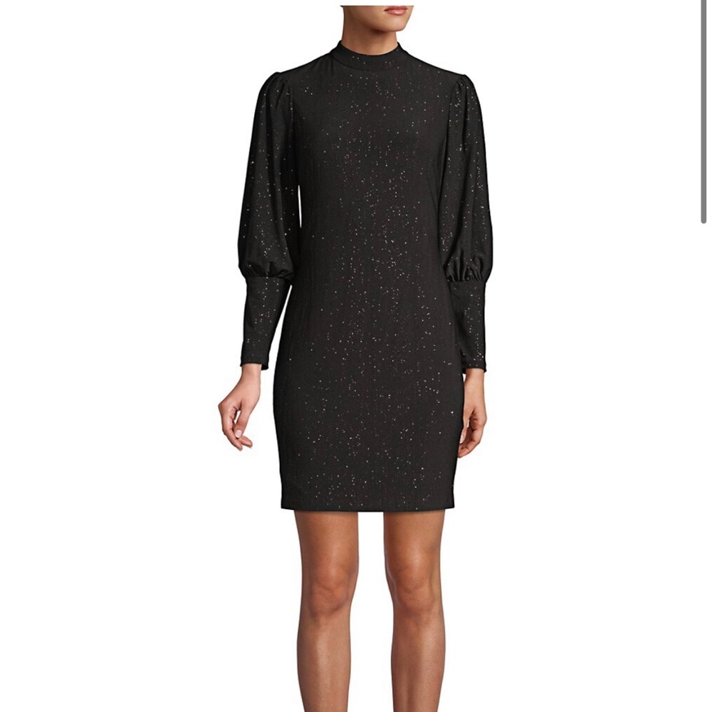 New:80s inspired with a shimmering metallic finish and blouson sleeves, Mockneck